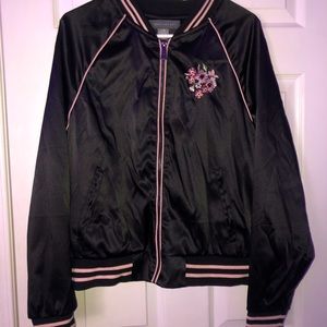 Suzy Shier bomber jacket with pink detailing.